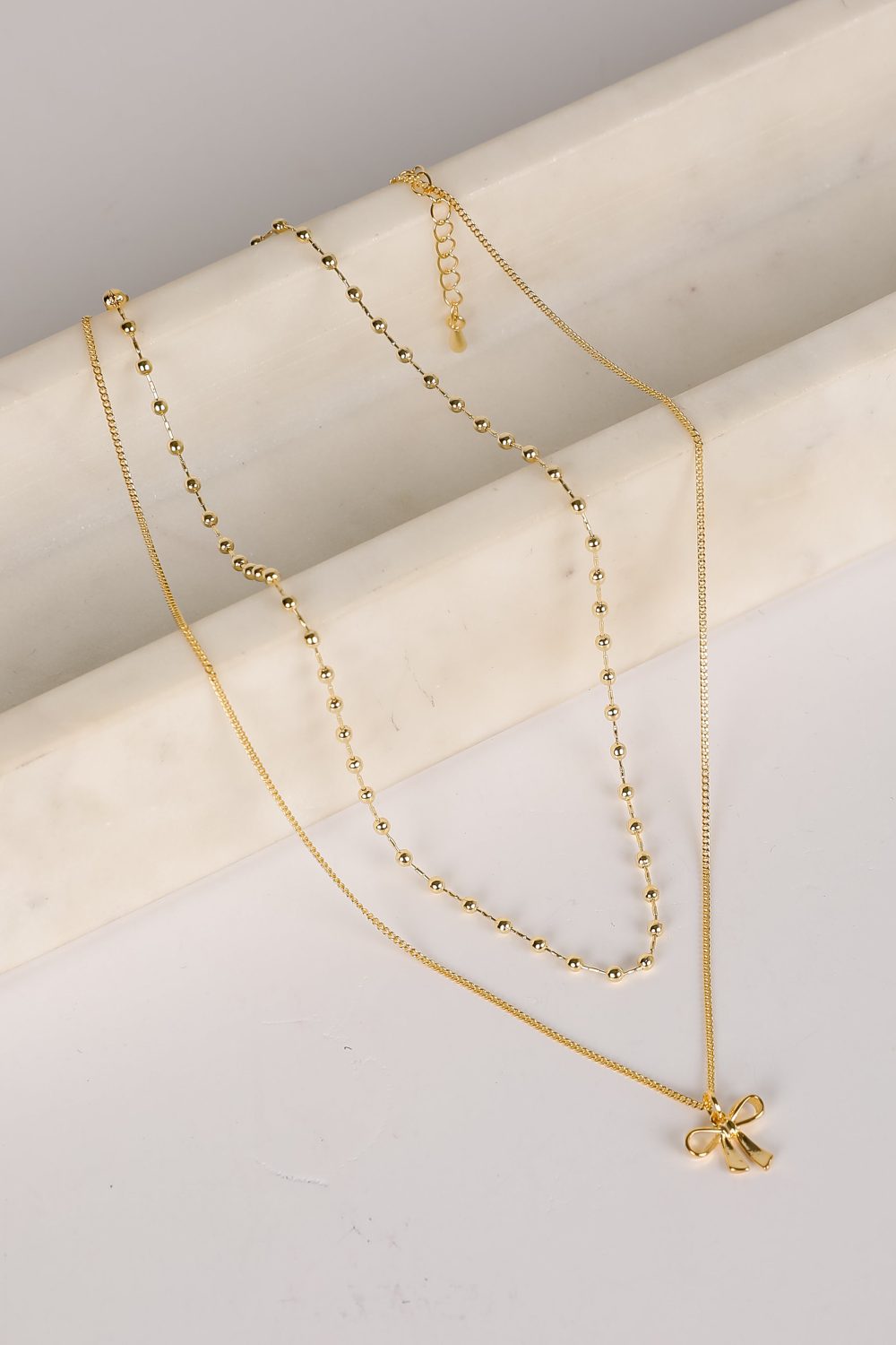 Allie Gold Layered Bow Charm Necklace - Image 4