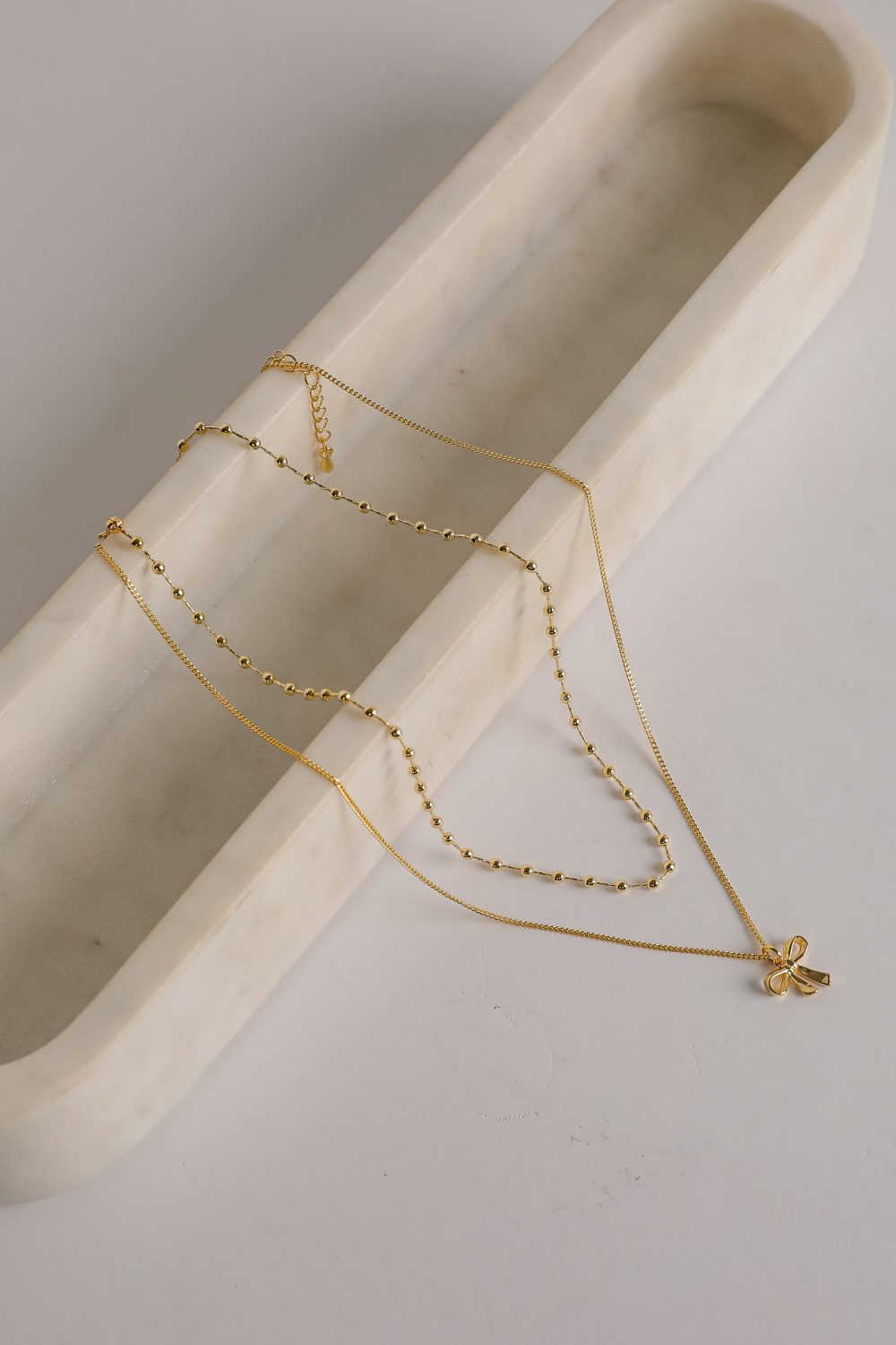 Allie Gold Layered Bow Charm Necklace - Image 5