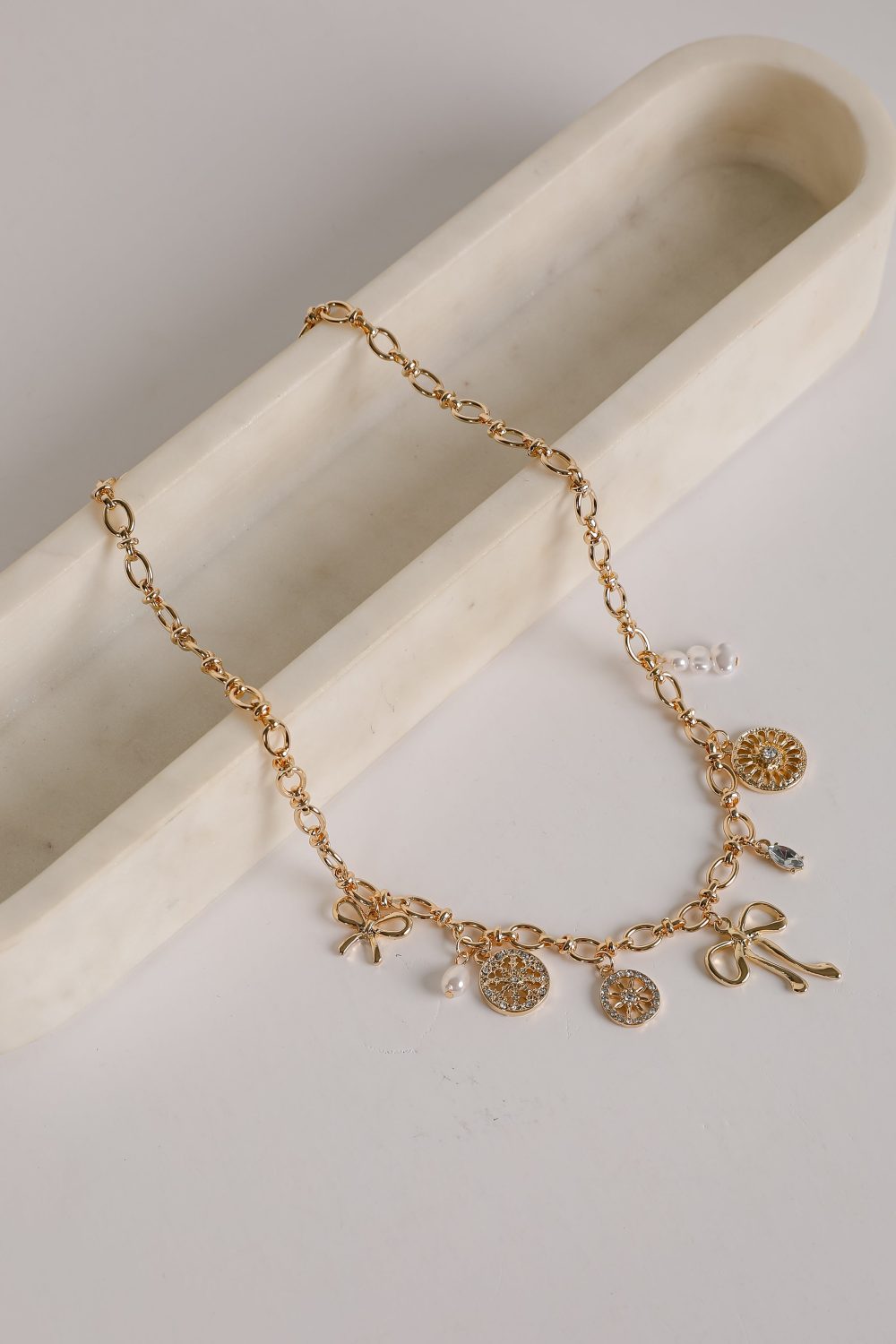 Meredith Gold Bow Charm Necklace - Image 5