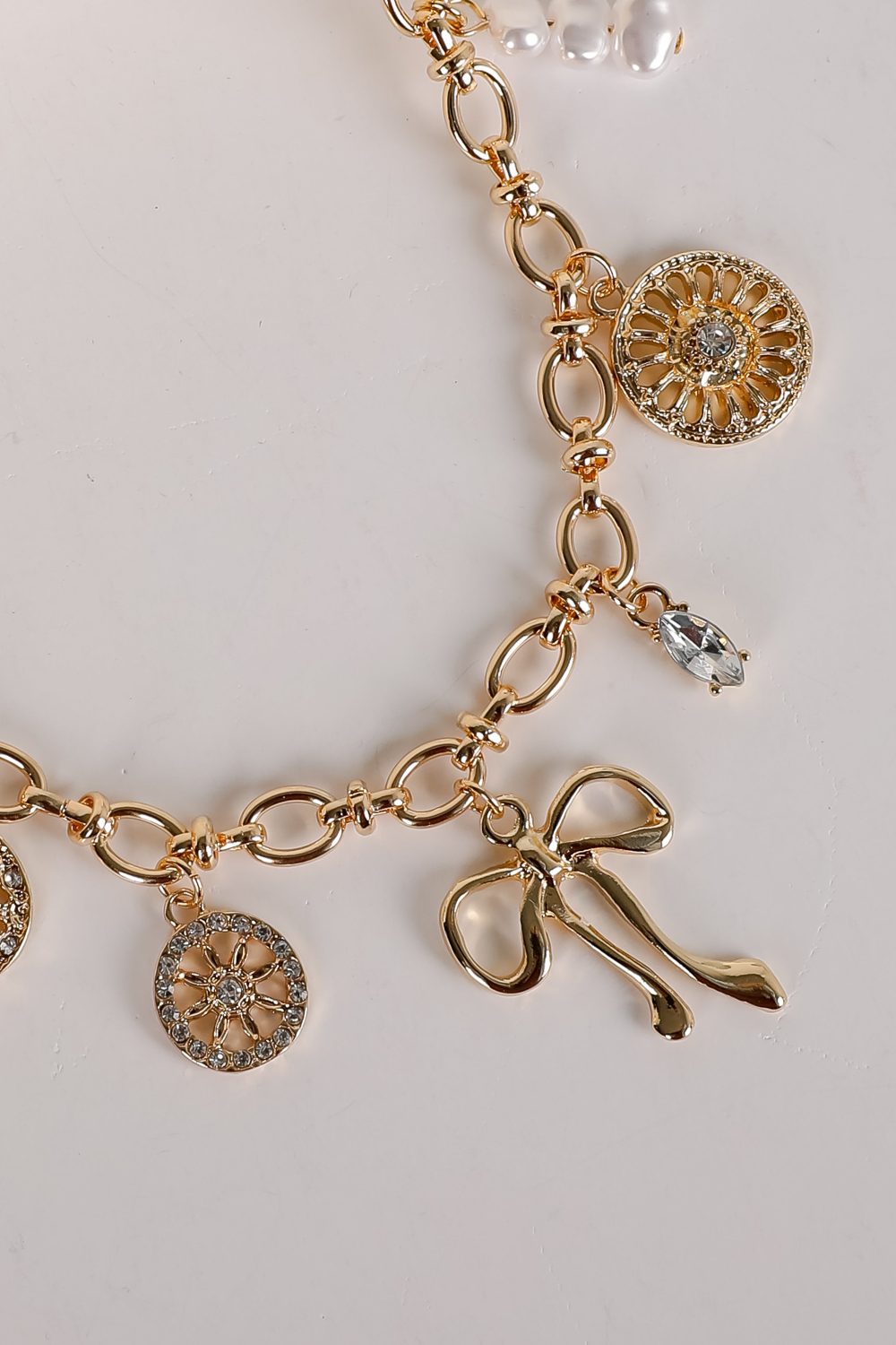 Meredith Gold Bow Charm Necklace - Image 2