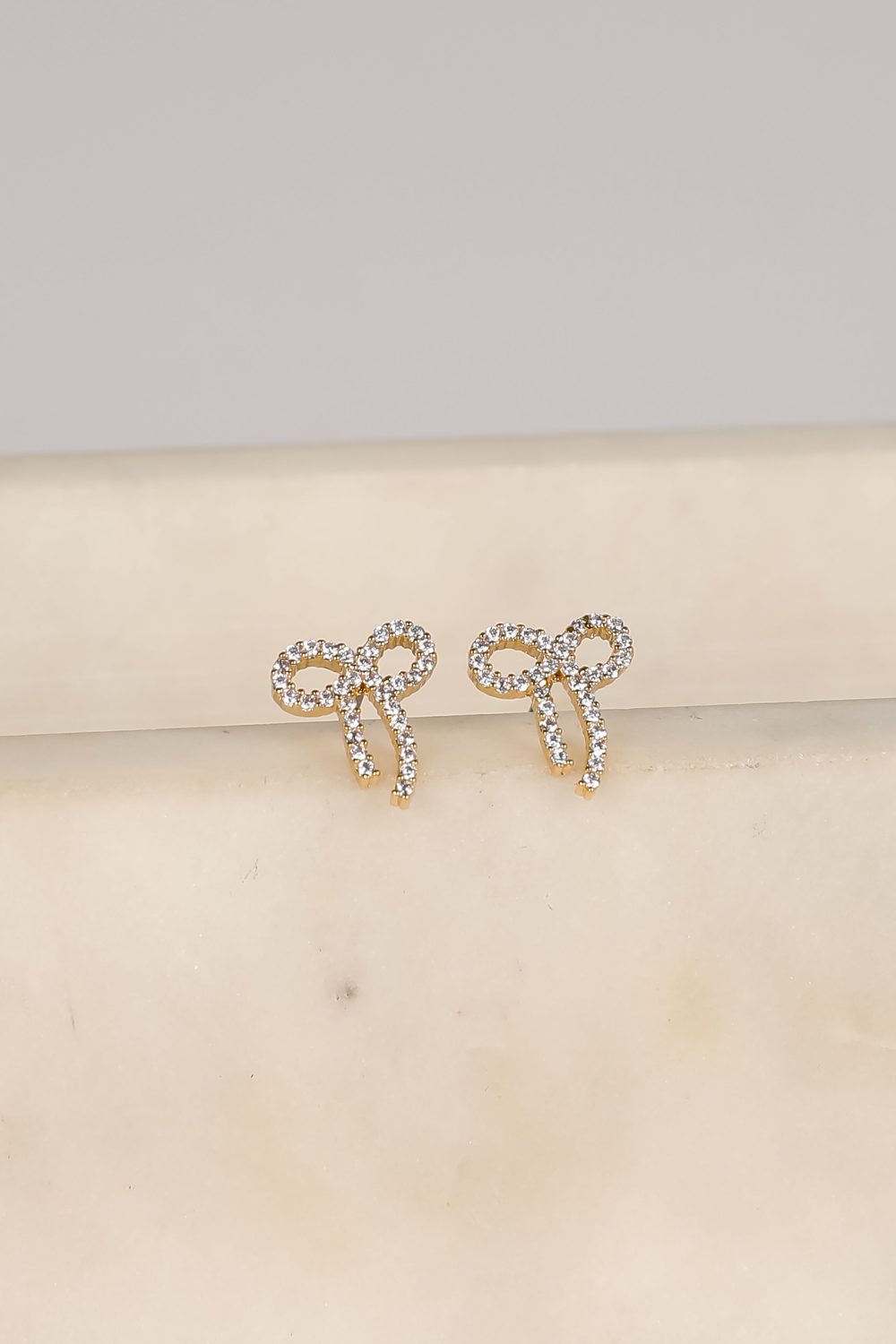 Daniella Gold Rhinestone Bow Earrings - Image 3