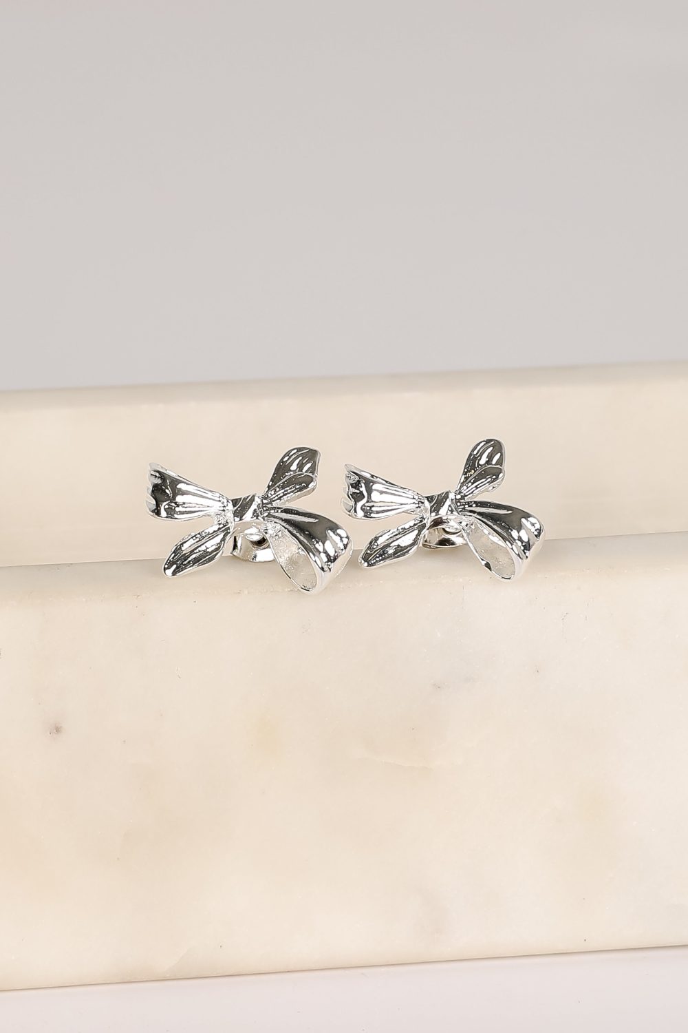 Marlee Silver Bow Earrings - Image 2